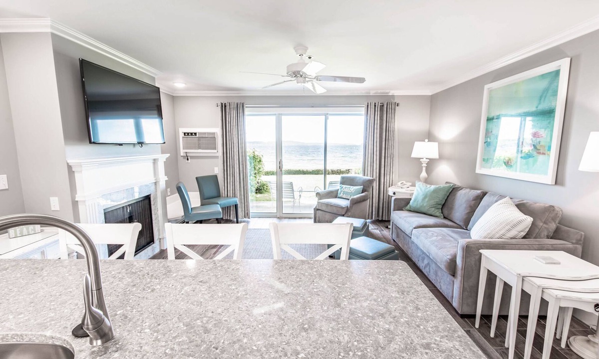 Boyne City Condo | 112 Water Street | Lake Charlevoix Views | Private Patio and Beach |