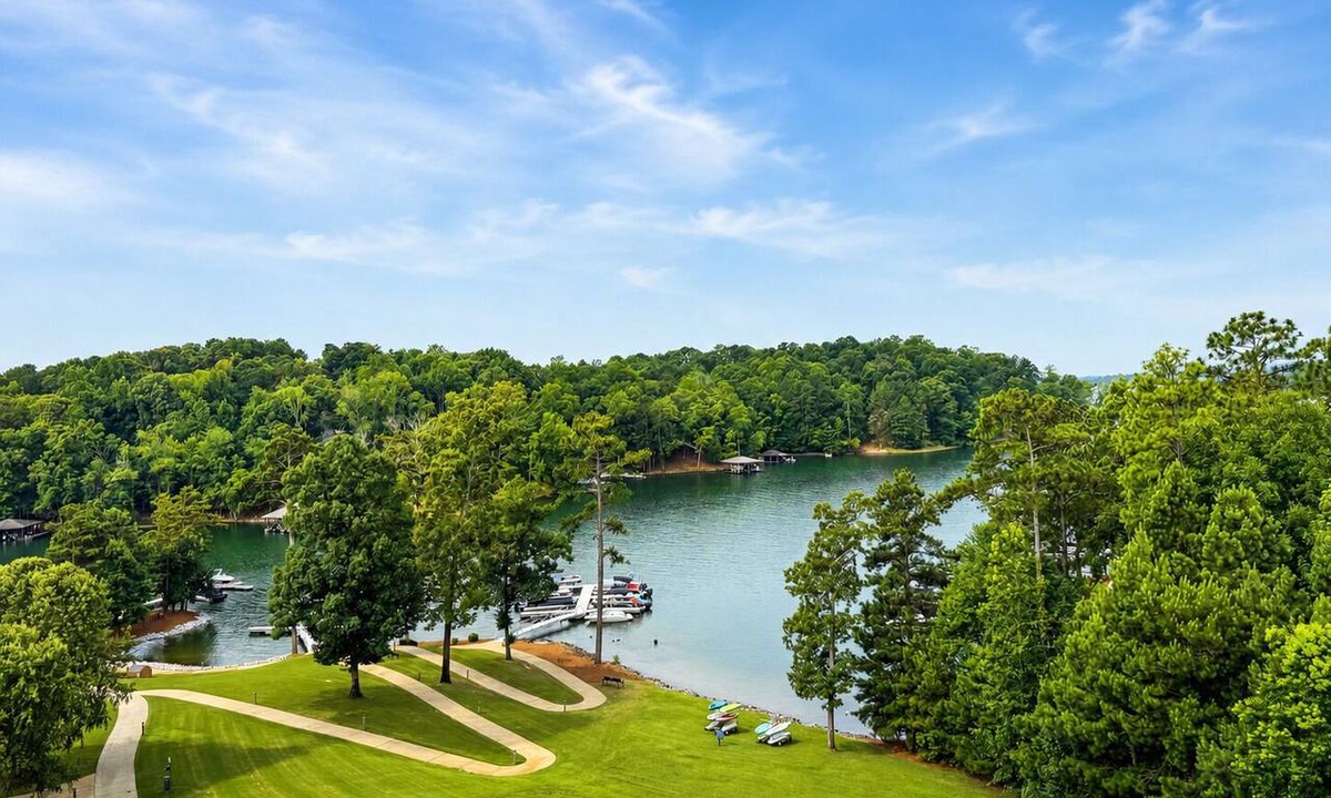 Dadeville Condo | BEAUTIFUL Lakefront Condo on Lake Martin, Sunsets, Boat Slip, Pool, Gym, Golf