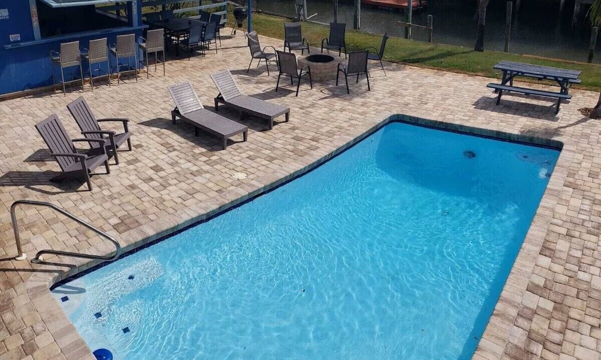 Butler Beach House | Cabana Escape – Waterfront Oasis with Heated Pool and Spacious Outdoor Living