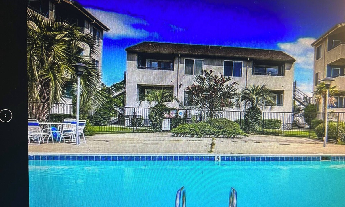 Slidell Condo | Charming 2Bd. waterfront living, pool, fitness rm. in serene Slidell