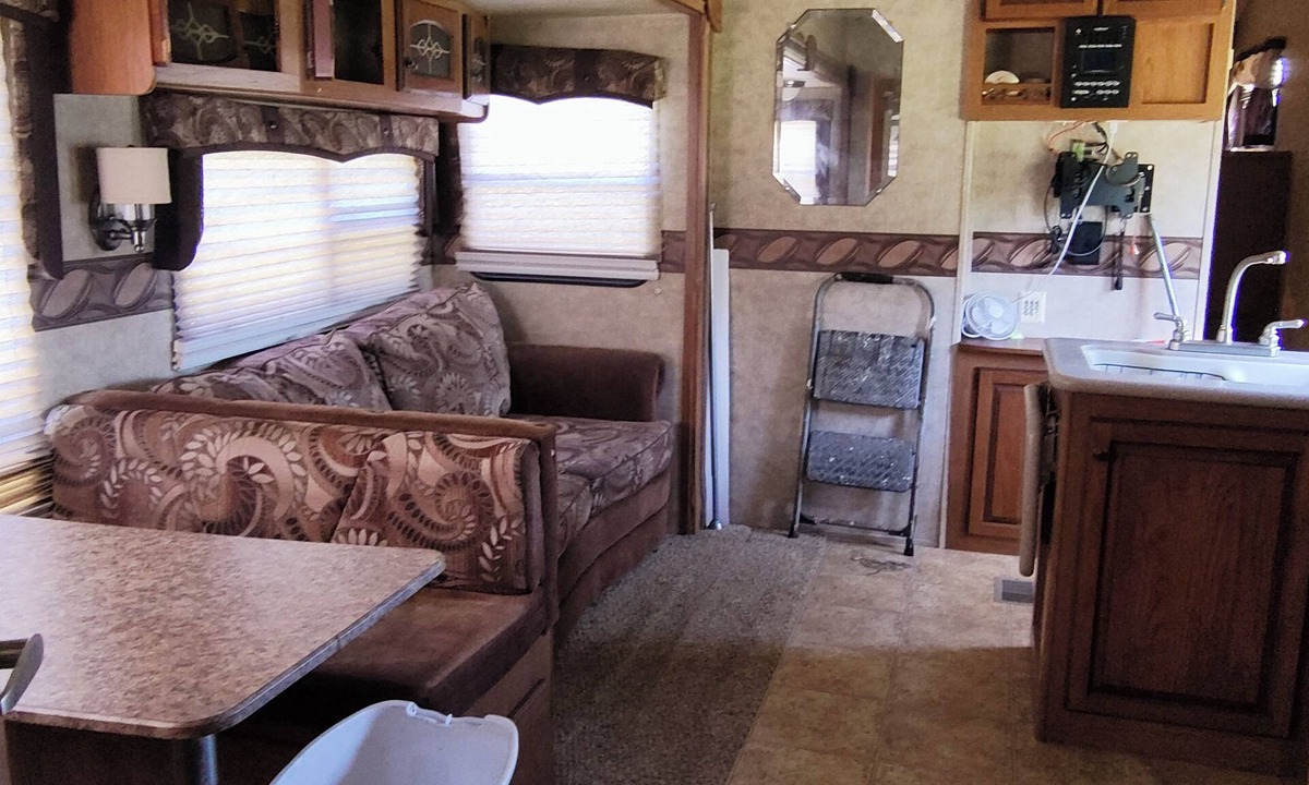 Ragley House | Cozy RV has 2 bedrooms, an outdoor kitchen with a grill & fridge