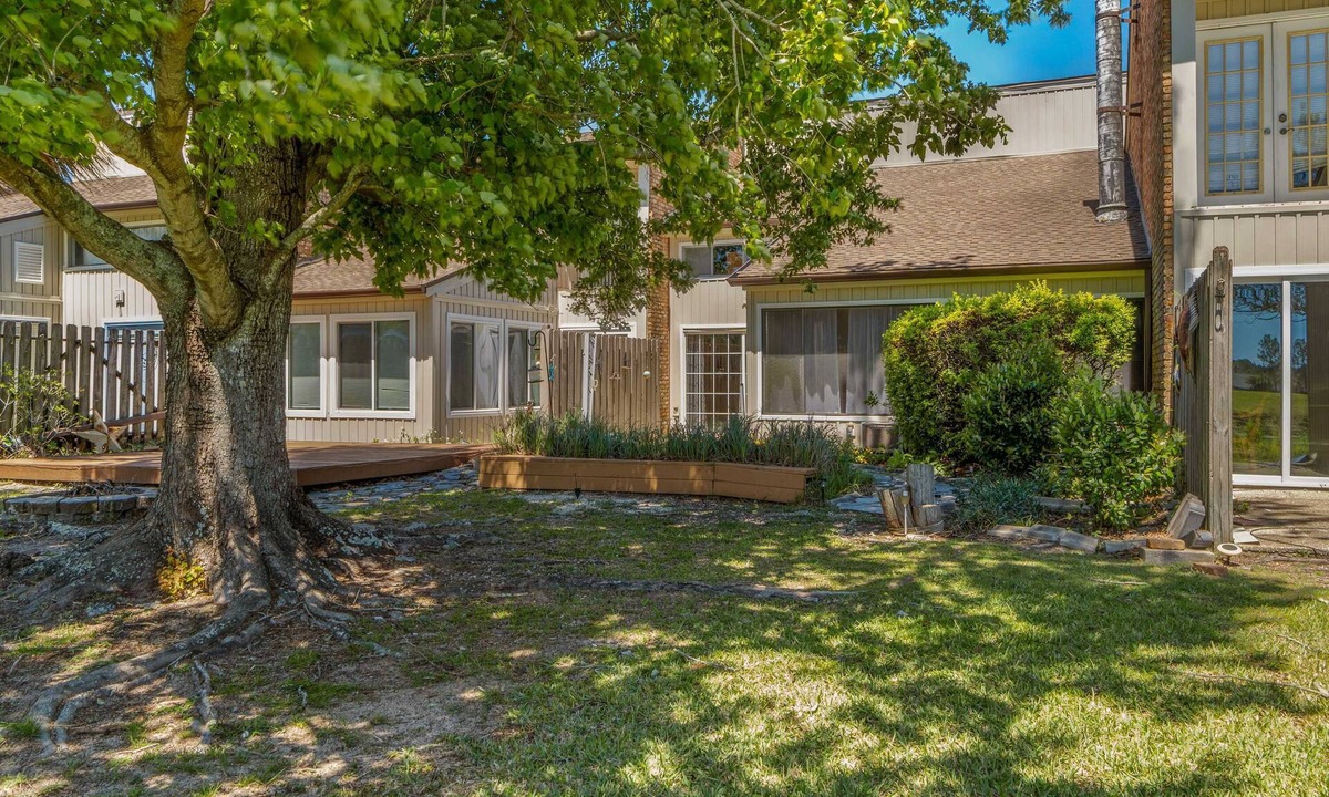 Perdido Bay Villas Condo | Dog-friendly coastal townhome with golf course views, patios, & washer/dryer
