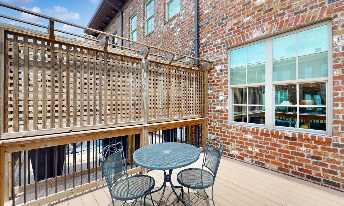 Hitch Village - Fred Wessels Homes House | Dog-friendly townhouse with modern kitchen, balcony, garden tub, & central AC