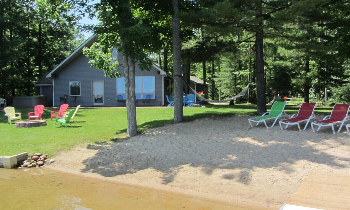 Interlochen Cottage | Hidden Gem Cottage on Bass Lake with Hot Tub - Summer Memories Last Forever