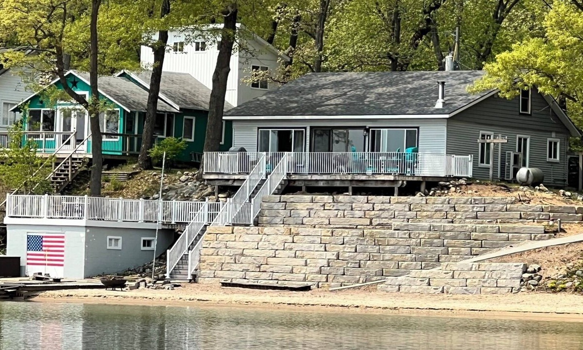 Baldwin Cottage | Huge sandy beach with amazing lake view directly on Big Star Lake!