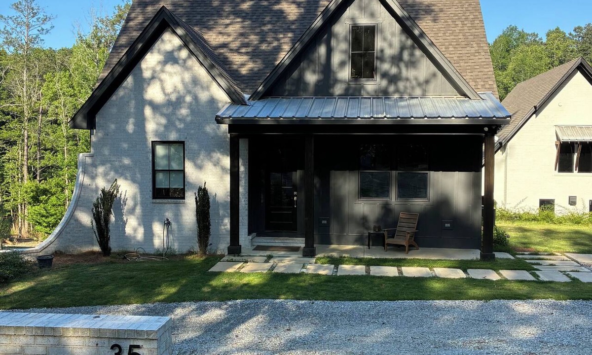 Eclectic Cottage | Lake Martin House on the water, 2 bedroom 2 bath NEW! Boat slip! Sandy beach