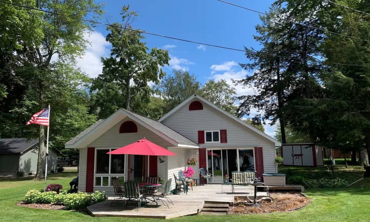 Grayling Cottage | Lakefront Oasis w Beach + Dock For Your Boat
