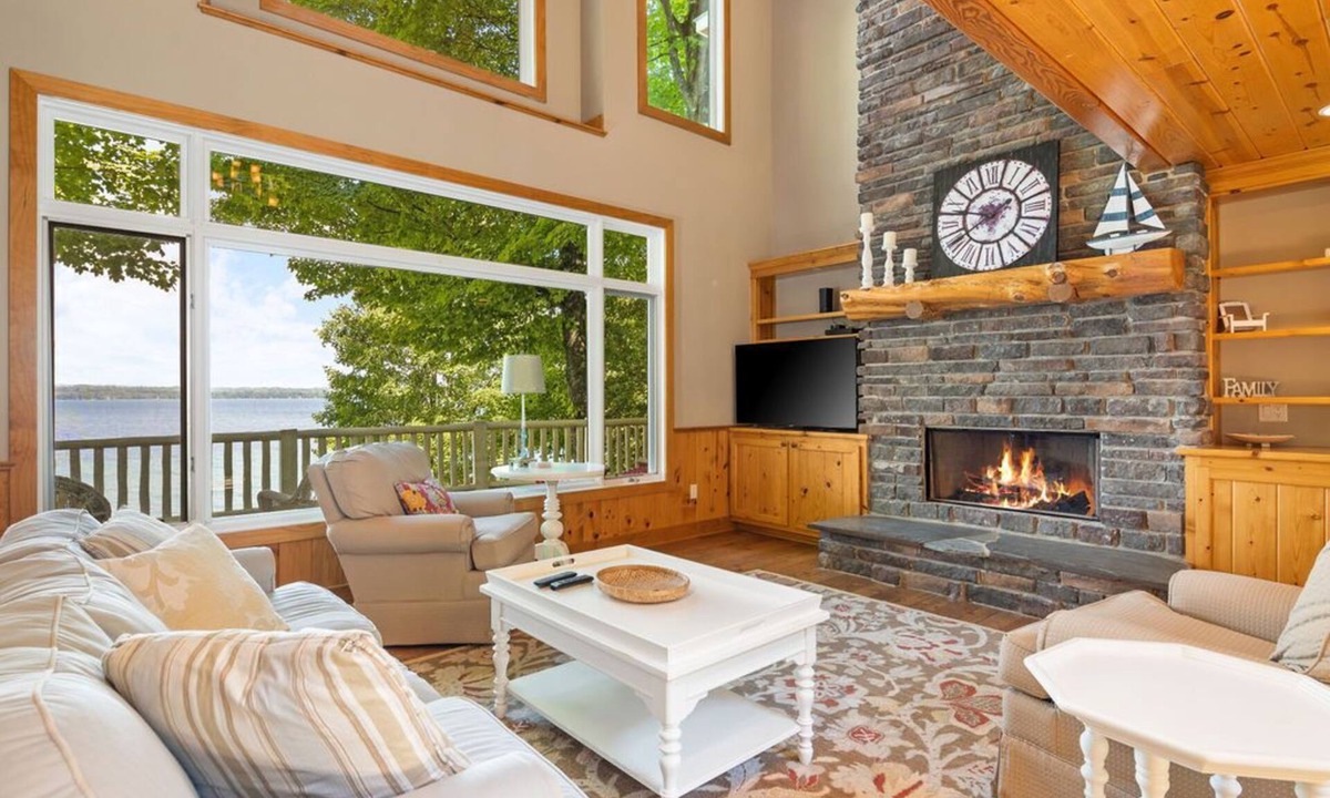 Kewadin House | Lakefront Torch Lake Home - Cottage Feel w/5 BR and Over 4K Sq Ft, Private Dock