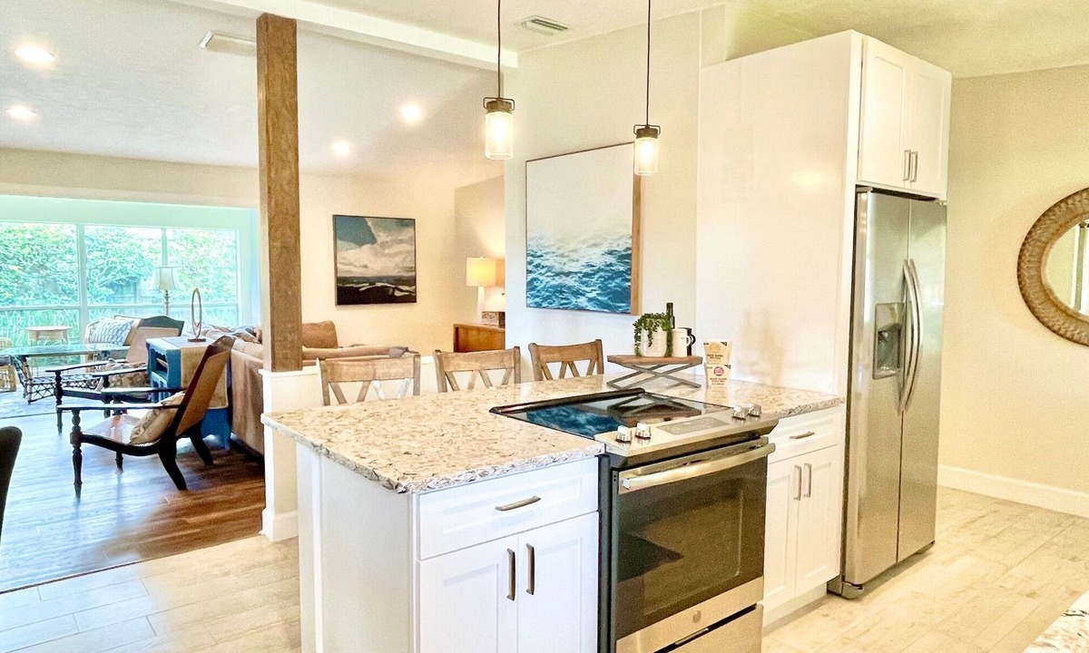 Maitland House | Lakewood Luxury 3/2 Home with Sunroom plus Fenced Yard and Covered Patio