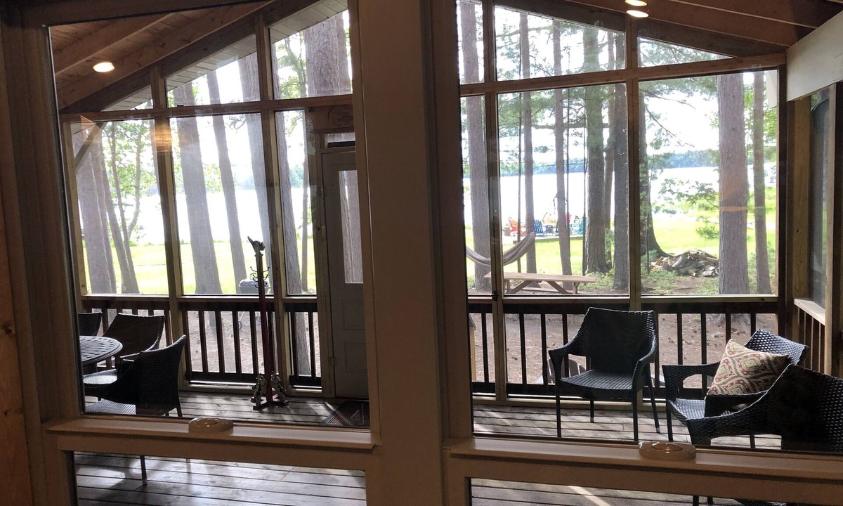 Eagle River Cottage | Pet Friendly Lakefront Cottage on Crystal Clear Private Meta Lake!