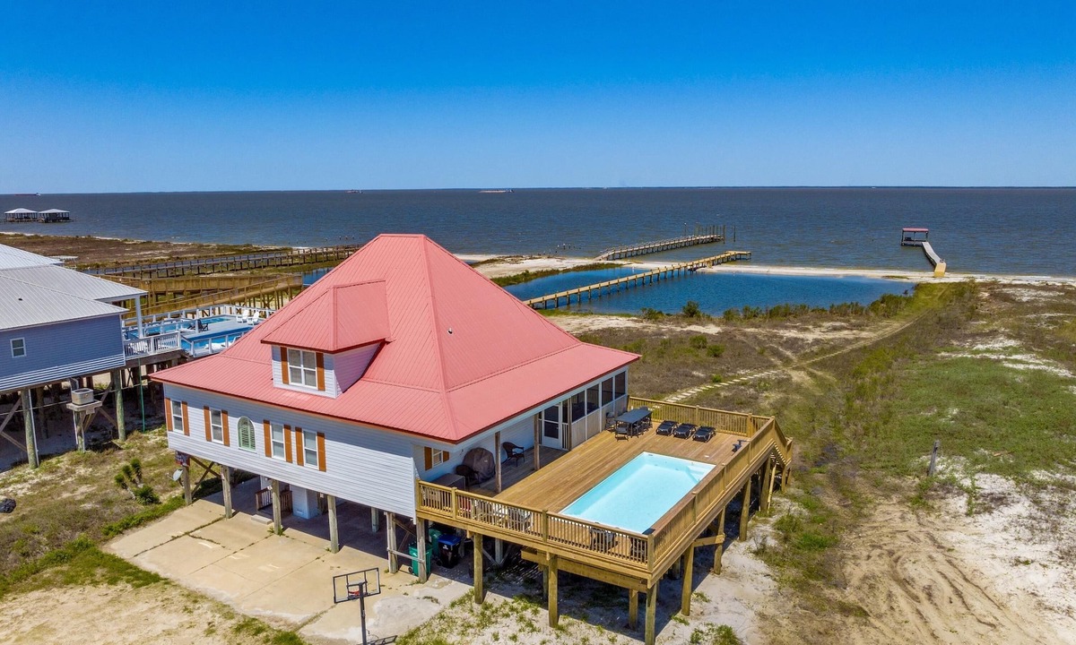 Dauphin Island House | Pool! DOCK! Two Master Bedrooms. Private & public beach access. Sleeps 12
