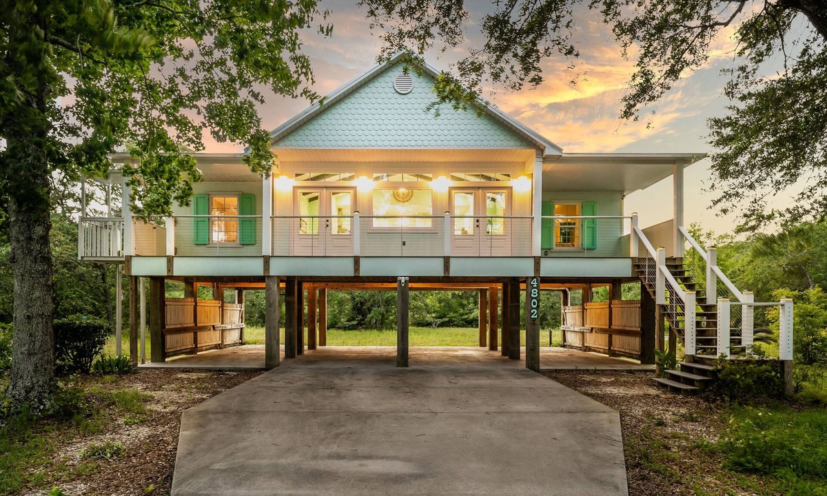 Ocean Springs House | Sassy Seas 2BR Cottage near Ocean Springs: Gulf Views, w/Balcony & Fire Pit
