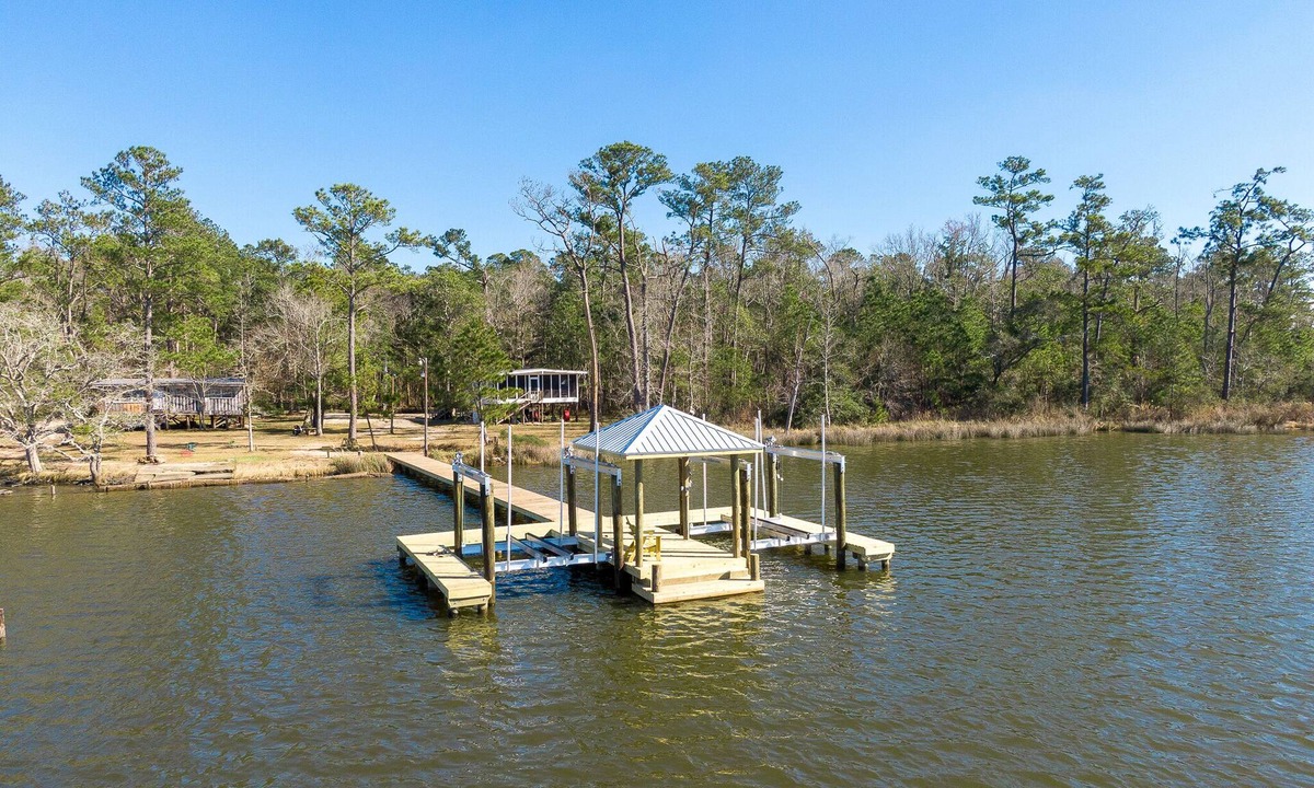Foley Cabin | Secluded waterfront fishing cabin, boat dock, pier, sunsets, boat to beach