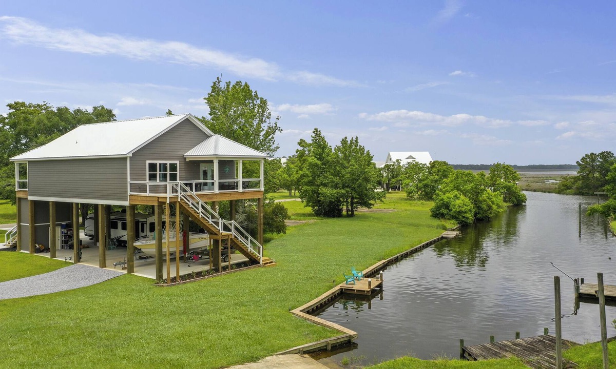 Biloxi House | Stunning Waterfront home with private boat launch!