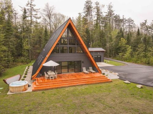 Indian River House | TreeTops Ayframe, Supersized AFrame on the River with Hot Tub
