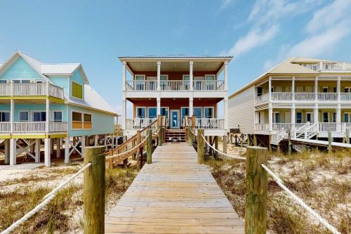 Southpointe House | Unforgettable Beachfront Condo wBalcony Gulf Views AC Shared Pool Hot Tub