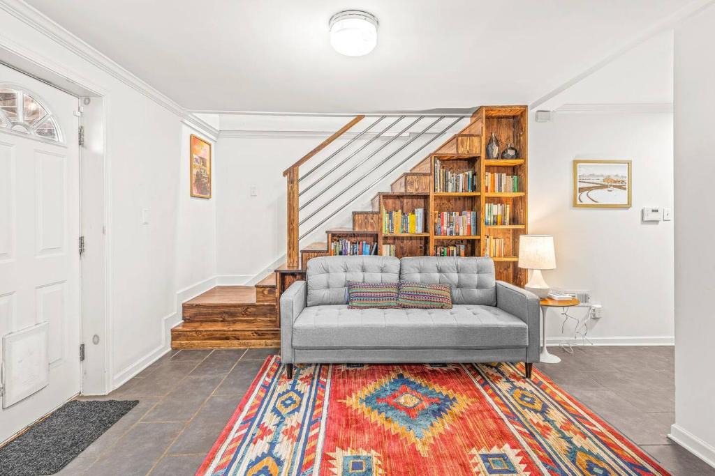 East Side House | Vibrant Hidden Bookcase Door 4Bd Garage Game Room