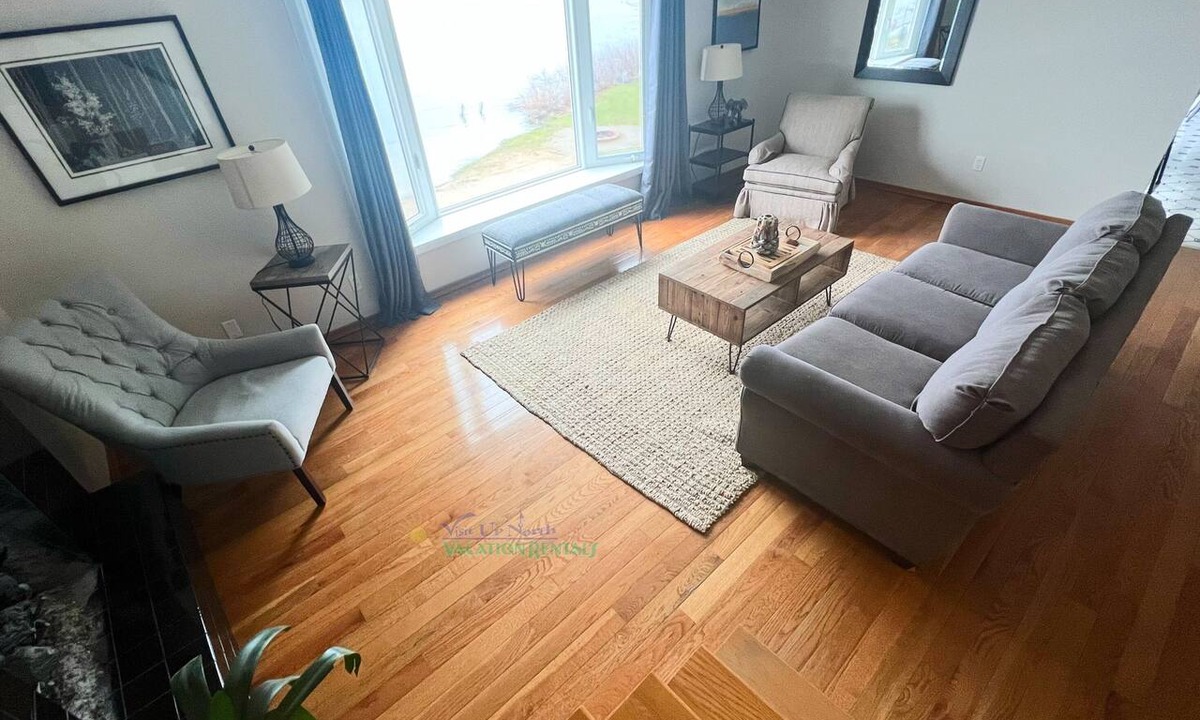 Traverse City House | Waterfront Bass Lake in TC, Game room, A/C, firepit, Dock, Canoe Dog ok.