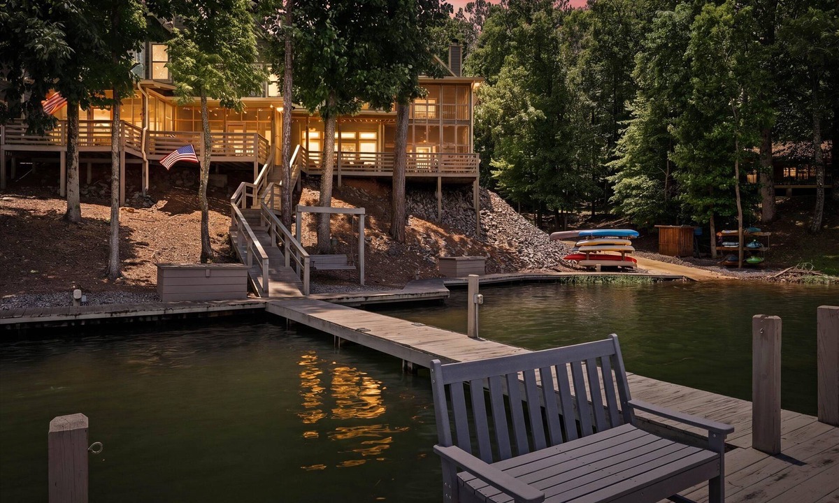 Jacksons' Gap House | Waterfront Lake Martin townhome sleeping 10. Features 2 king suites with private baths, a bunk room for 6, boat slip, dock access, boat ramp, 2 kayaks, and a screened porch. Just 30 miles from Auburn.