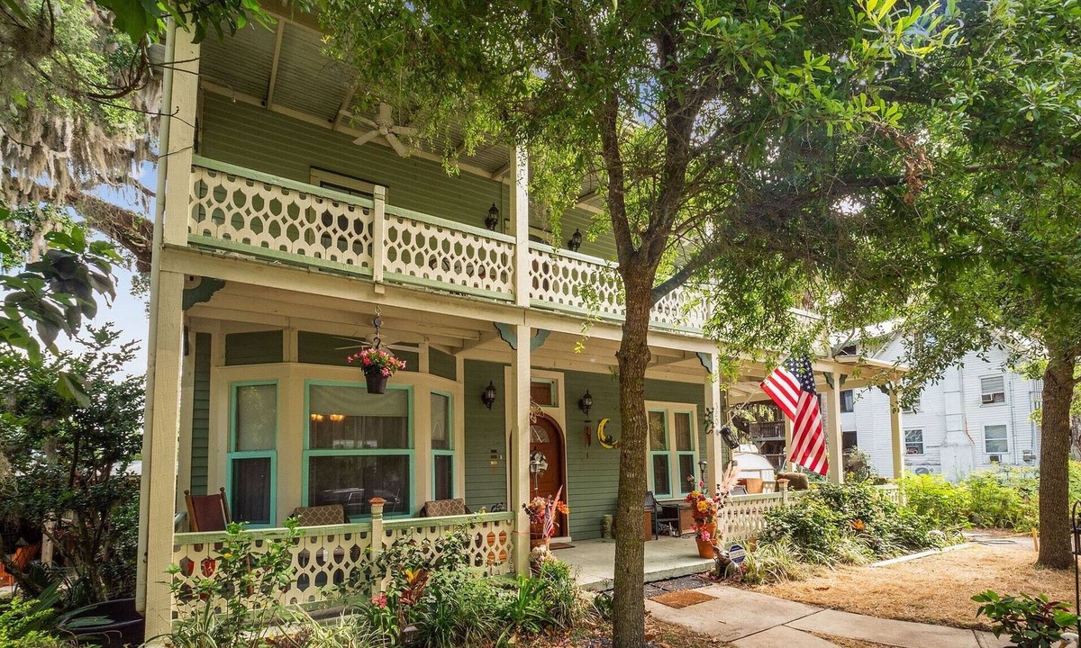 Crescent City House | West Stella Lake House with Outdoor Pool Table & Fireplace by RedAwning