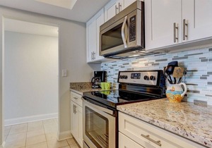 Oceanfront 2BR/2BA condo with pool, balcony, and beach access.