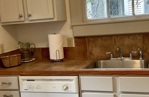 Uptown Historic District Cottage | 120 year old carriage house in uptown residential neighborhood