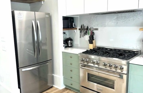 Old Town House | 2 Primary Kings! Screened Porch! EV Charger!