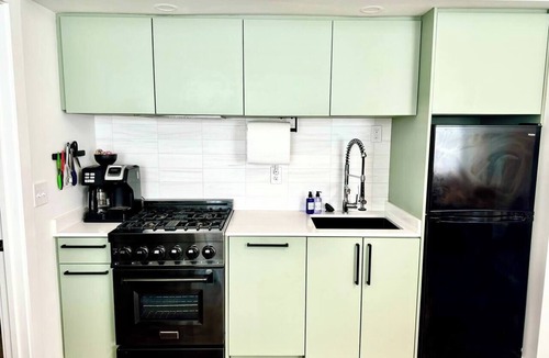 Old Town House | 2 Primary Kings! Screened Porch! EV Charger!