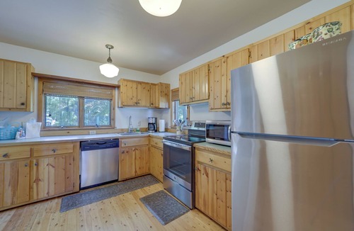 Rapid City Cottage | 21 Mi to Slopes! Torch Lake Home w/Private Beach