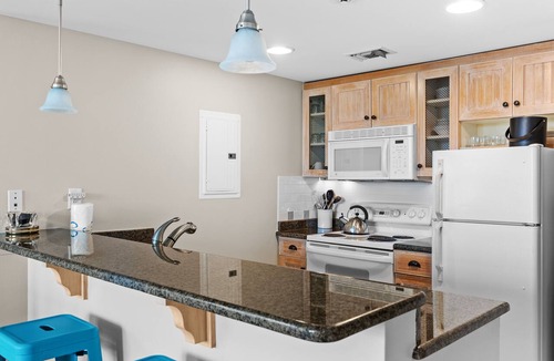 Baytowne Wharf Condo | 2BR at Baytowne Wharf! Tropical Lagoon Pool/Hot Tub, Beach Tram, Gym, Balcony