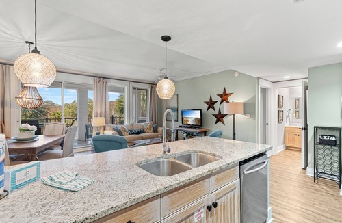 Baytowne Wharf Condo | 2BR Condo at Baytowne! Walk to Wharf, GOLF CART, Tropical Pool & Hot Tub.