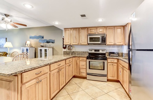 Fernandina Beach Condo | 2nd Floor 2 Bed/2 Bath Beachfront condo sleeps 6. patio & pool.