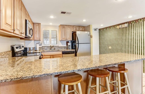 Fernandina Beach Condo | 2nd Floor 2 Bed/2 Bath Beachfront condo sleeps 6. patio & pool.