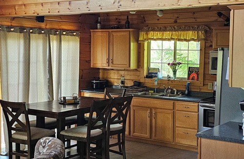 Iron River House | 3 bed/2 bath, Pet friendly Log Lakehouse on 5 acres. Private and & relaxing.