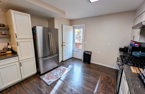 Grawn House | 3 Bedroom house w/lake access, hot tub and pet friendly!