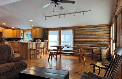 Fife Lake Cabin | 3 bedroom log cabin on the lake. Perfect for ice fishing and snowmobiling!