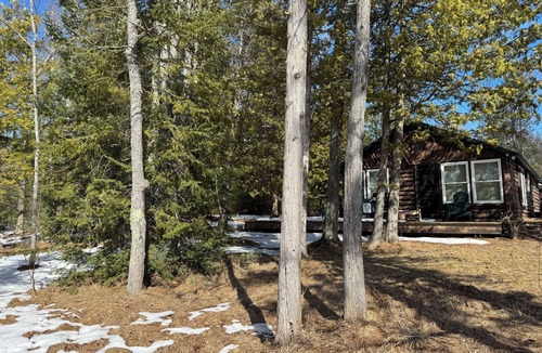 Fife Lake Cabin | 3 bedroom log cabin on the lake. Perfect for ice fishing and snowmobiling!