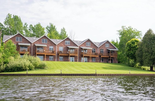 Ludington Condo | #4 Lakefront Hamlin Lake Retreat - Sleeps 10