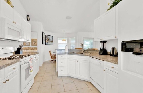 Tuscan Ridge Villa | 4BR Home with West Facing Pool and Game Room Near Disney & Shopping