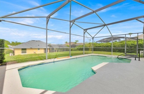 Tuscan Ridge Villa | 4BR Home with West Facing Pool and Game Room Near Disney & Shopping