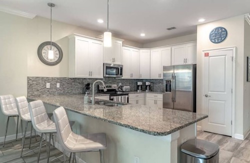 Davenport House | 9 BR Villa Steps to Oasis Resort & Waterpark/Pets OK/Game Room.