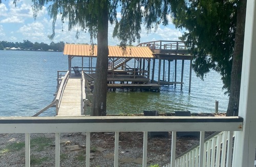 New Roads House | A fishing and swimming paradise . top tier lakeside house to enjoy
