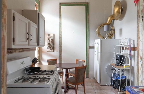 Treme Apartment | A funky-chic one-bedroom apartment with a private entrance and a full kitchen.