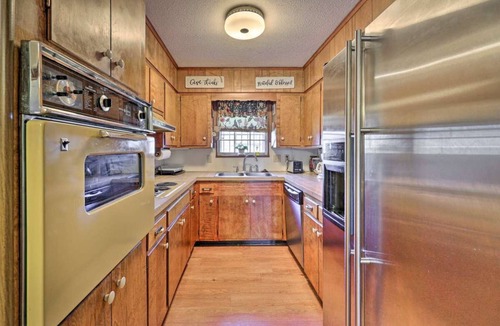Pine Bluff House | "Abbie's Place: Spacious 4BR Sanctuary with Sunroom and Private Backyard"