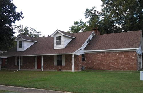 Pine Bluff House | "Abbie's Place: Spacious 4BR Sanctuary with Sunroom and Private Backyard"