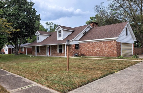 Pine Bluff House | "Abbie's Place: Spacious 4BR Sanctuary with Sunroom and Private Backyard"