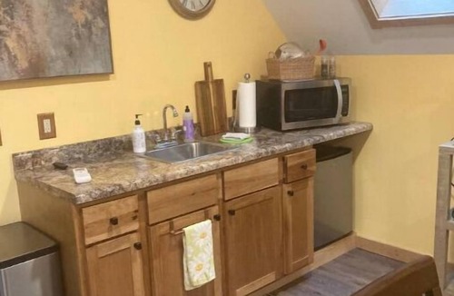 Lake Ann Apartment | And a River Runs Through It….