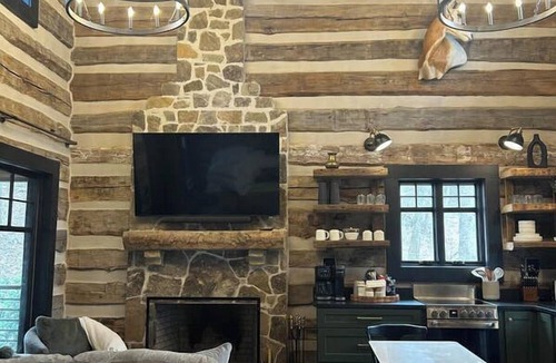 Albertville Cabin | Antique log cabin with waterfall and 360 degree views of beauty!