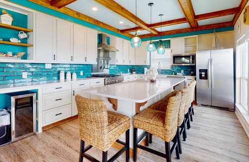 Royal Lagoons House | Bayfront home with boat slip, scenic balcony, W/D, & AC - close to beaches