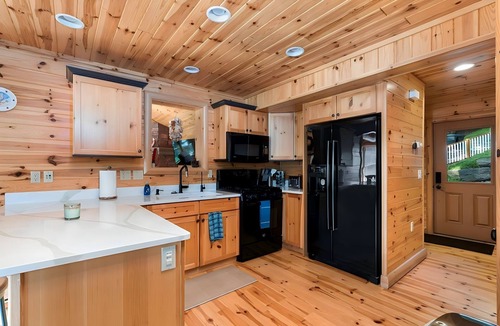 Gaylord Cabin | Bear’s Den Lakefront Cabin with Hot Tub and Views